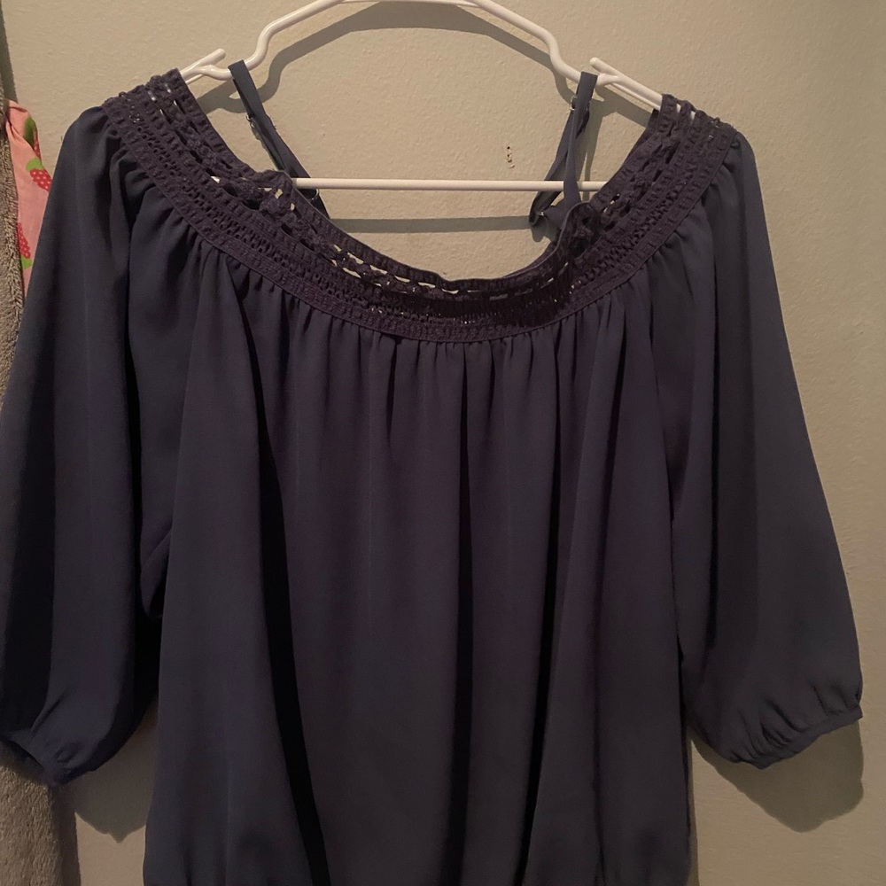 This is a dressy shirt perfect for any event!
